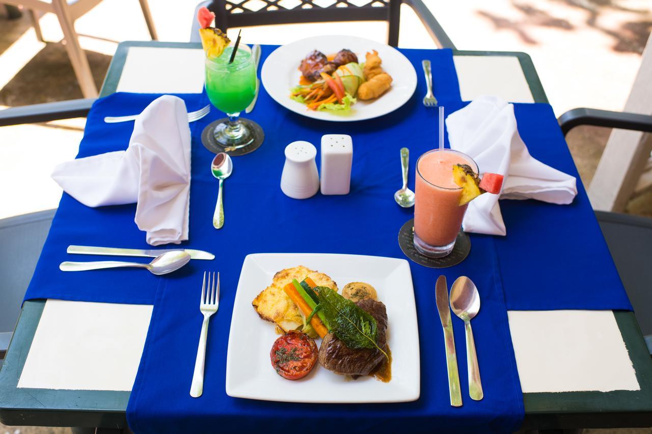 Merrils Beach Resort II Негрил Экстерьер фото